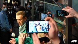 Russian opposition leader Alexei Navalny is seen at the passport control point at Moscow's Sheremetyevo airport on January 17, 2021.