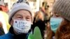 FILE - Climate activists attend the March for Climate in a protest against global warming in Katowice, Poland, Saturday, Dec. 8, 2018, as the COP24 UN Climate Change Conference takes place in the city.