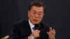 South Korean President Moon Jae-in answers reporters' question during his New Year news conference at the Presidential Blue House in Seoul, South Korea, Jan. 10, 2018.