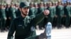 FILE - An Iranian Officer of Revolutionary Guards,is is shown during graduation ceremony, held for the military cadets in a military academy, in Tehran, Iran, June 30, 2018.