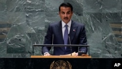 FILE - Qatar Amir Sheikh Tamim bin Hamad Al Thani addresses the 79th session of the United Nations General Assembly, Sept. 24, 2024.