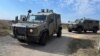 Israeli military vehicles patrol in the Israeli-occupied Golan Heights near the border with Syria on Dec. 6, 2024.