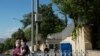 FILE - Turkish police officers stand guard outside the residence of Israeli embassy in Ankara, Turkey, May 21, 2021. 