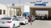 People wait to cross into Syria at Jordan's Jaber border crossing checkpoint, near Syria's Naseeb checkpoint, near Mafraq, Jordan, Oct. 15, 2018. 