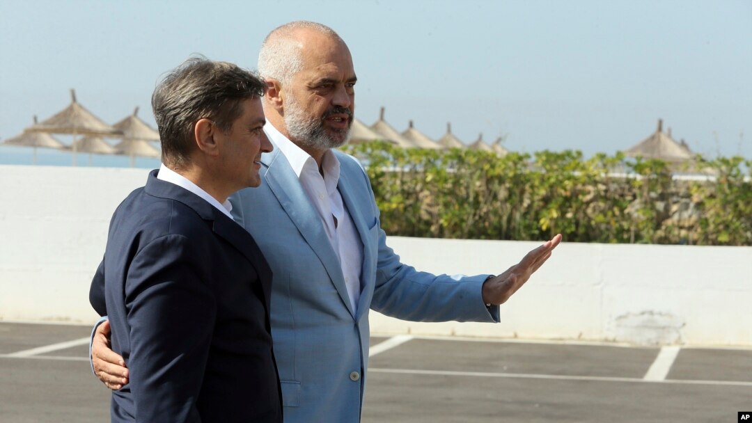 Albanian Prime Minister Edi Rama , right, welcomes Bosnia and Hercegovina's counterpart Denis Zvizdic during an an informal meeting of Western Balkans countries in the Albanian port city of Durres, 33 kilometers (20 miles) west of the Tirana.
