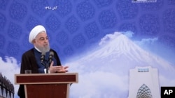 In this photo released by the official website of the office of the Iranian Presidency, President Hassan Rouhani speaks in a ceremony to inaugurate Azadi Innovation Factory in Pardis technology park in west of Tehran, Nov. 5, 2019. 