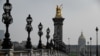 A picture taken on March 20, 2020 in Paris, shows a deserted bridge Pont Alexandre III, on the fourth day of a strict lockdown in France aimed at curbing the spread of COVID-19. 