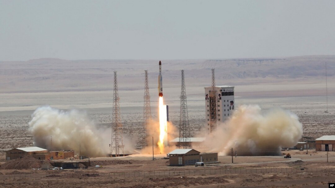 This photo, released by the official website of the Iranian Defense Ministry, July 27, 2017, claims to show the launching of Simorgh satellite-carrying rocket in an undisclosed location in Iran.