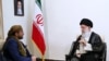 A handout picture provided by the office of Iran's Supreme Leader Ayatollah Ali Khamenei shows him meeting with Mohammed Abdul-Salam, left, spokesman for Yemen's Huthi rebels, during their meeting at Khamenei's residence in Tehran, Aug. 13, 2019.