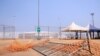 Barriers lie on the ground at the entrance of Olembe Stadium in Yaounde, Cameroon, Jan. 25, 2022. Eight people were killed and many more injured in a crush outside the stadium on Jan. 24, 2022, ahead of an Africa Cup of Nations match.