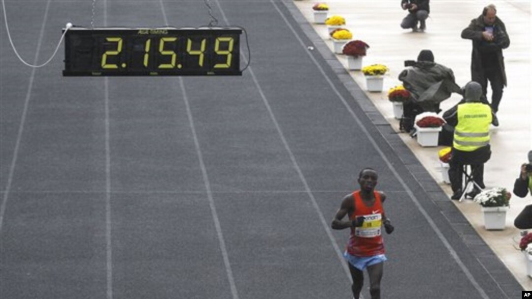 Daniel Ndiritu Gatheru of Kenya finishes third the Athens Classic Marathon at the Panathinaikon Stadium in Athens, on Sunday, Nov. 13, 2011. About 18,000 people took part in the marathon and two shorter races of 5 kms and 10 kms as the race was run in c