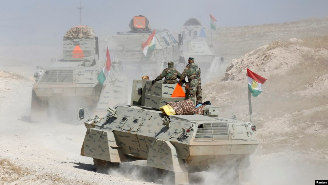 Peshmerga forces advance in the east of Mosul to attack Islamic State militants in Mosul, Iraq, Oct. 18, 2016. 