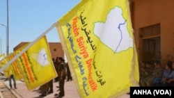 Dîmeneke endamên Hêzên Sûrîya Demokratîk (Arşîv)