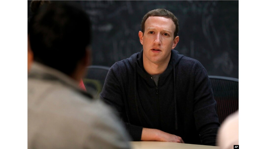File - Facebook CEO Mark Zuckerberg meets with a group of entrepreneurs and innovators in St. Louis, MO., Nov. 9, 2017.