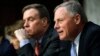 Senate Intelligence Committee chairman Sen. Richard Burr, R-NC, right, speaks next to Vice Chairman Sen. Mark Warner, D-VA., during a Senate Intelligence Committee hearing on Russian election activity and technology, Nov. 1, 2017, on Capitol Hill in Washington.