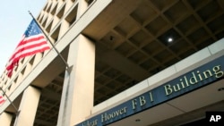 FILE - The FBI's J. Edgar Hoover headquarters building is seen in Washington on Nov. 2, 2016. 
