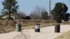 The driveway to the Shatto family home, rear left, is seen in Gardendale, Texas, March 1, 2013.