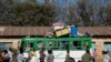 FILE - A bus carrying displaced people arrives at the Tsehaye primary school, which was turned into a temporary shelter for people displaced by conflict, in the town of Shire, Tigray region, Ethiopia, March 14, 2021