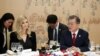 South Korean President Moon Jae-In talks with Ivanka Trump during their dinner at the Presidential Blue House in Seoul, South Korea, Feb. 23, 2018. 