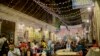 The introduction in recent years of lower-consumption LED bulbs mean many Cairo residents, like patrons and this street café, can continue to enjoy bright lights on a summer’s eve. 