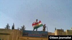 Bizavkarek li şûna ala hikûmetê Ala Kurdistanê bilind dike