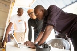 Satya Nadella CEO visiting Chris Baraka at Mawingu. (Courtesy Microsoft)