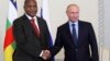 Russian President Vladimir Putin, right, shakes hands with Central African Republic President Faustin-Archange Touadera, in St. Petersburg, Russia, Wednesday, May 23, 2018. 