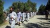 FILE - Prisoners are released from Bagram Prison in Parwan province, Afghanistan, May 26, 2020.