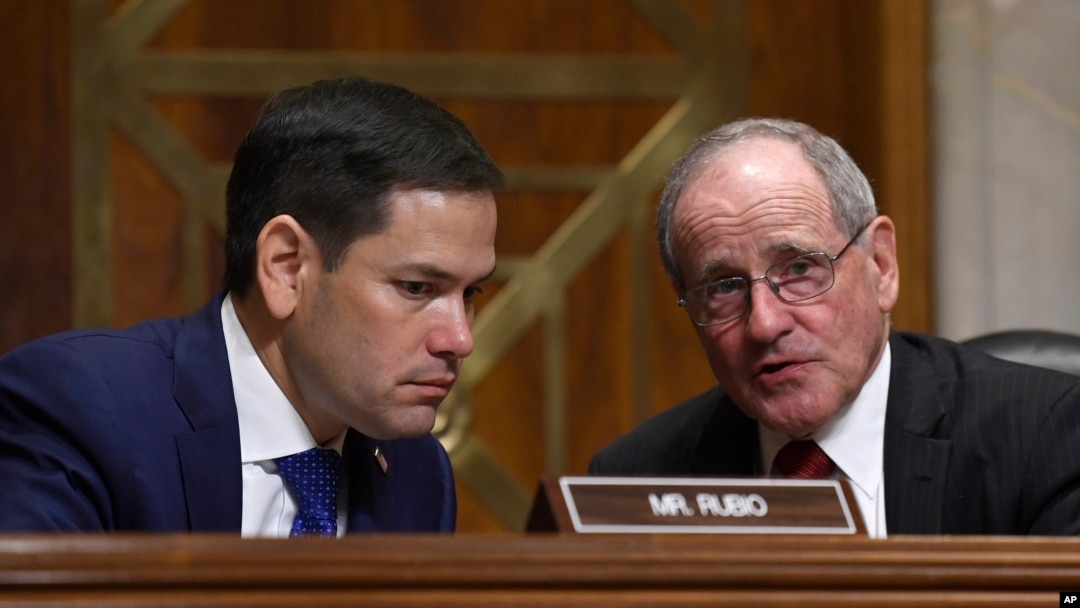 Senate Foreign Relations Committee Chairman Sen. James Risch, R-Idaho, right, talks with Sen. Marco Rubio, R-Fla., left, during a hearing with Secretary of State Mike Pompeo on Capitol Hill in Washington, Wednesday, April 10, 2019, to review the FY…