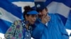 ARCHIVO - El presidente de Nicaragua, Daniel Ortega, y la vicepresidenta Rosario Murillo, durante un acto en Managua el 5 de septiembre de 2018.