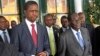 File - Zimbabwe President Robert Mugabe (R) and his Zambian counterpart Edgar Lungu step out of State House in Harare, February 2015.