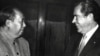 Chinese leader Mao Zedong shake hands with Richard Nixon after their meeting in Beijing 22 February 1972 during the U.S. President's official visit in China.