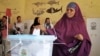 FILE - A woman casts her vote in the presidential election in Hargeisa, in the semiautonomous region of Somaliland, Nov. 13, 2017.
