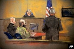 In this courtroom sketch, Maj. Nidal Hasan, center, sits before the judge, U.S. Army Col. Tara Osborn, during the sentencing phase of his trial, Aug. 26, 2013, in Fort Hood, Texas.