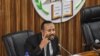 FILE - Ethiopia's Prime Minister Abiy Ahmed addresses the parliament in Addis Ababa, July 1, 2019. Ahmed's government has dropped charges against Israeli businessman Menashe Levy, who had been in prison since 2015. Levy has since been released.