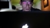 Vietnamese Internet activist Nguyen Lan Thang chats on Facebook at a cafe in Hanoi, Nov. 27, 2013.