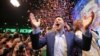 Ukrainian presidential candidate Volodymyr Zelenskiy reacts following the announcement of the first exit poll in a presidential election at his campaign headquarters in Kyiv, April 21, 2019. 