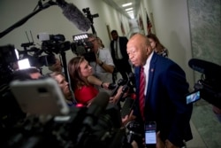 FILE - House Committee on Oversight and Reform Chairman Rep. Elijah Cummings, D-Md., speaks to members of the media on Capitol Hill in Washington, July 18, 2019.