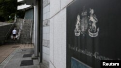 A man walks outside the British Cosulate-general office in Hong Kong, China, August 20, 2019. REUTERS/Willy Kurniawan