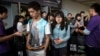 FILE - Students leave after a Scholastic Assessment Test session at AsiaWorld-Expo in Hong Kong Nov. 2, 2013.