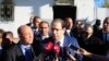 Tunisian Prime Minister Youssef Chahed speaks to reporters as he visits a sacked police station in El Battan, 35 kms west of Tunis, Jan. 10, 2018.