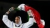 FILE - Kimia Alizadeh Zenoorin of Iran celebrates after winning the bronze medal in a women's Taekwondo 57-kgcompetition at the 2016 Summer Olympics in Rio de Janeiro, Brazil, Aug. 18, 2016.
