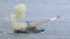 FILE - A Taiwanese navy frigate launches a 'Harpoon' surface-to-surface missile May 16, 2007, during the second day of the annual Hankuang military exercises off Ilan, central eastern coast of Taiwan.