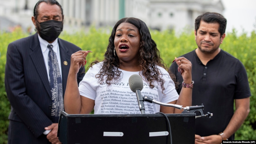 Rep. Cori Bush, D-Mo. (C) with Rep. Al Green, D-Texas (L) and Rep. Jimmy Gomez, D-Calif., (R) speak to the press after it was announced that the Biden administration will enact a targeted nationwide eviction moratorium Aug. 3, 2021. (AP Photo/Amanda Andrade-Rhoades)