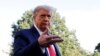 U.S. President Donald Trump speaks to the media on the South Lawn of the White House in Washington.