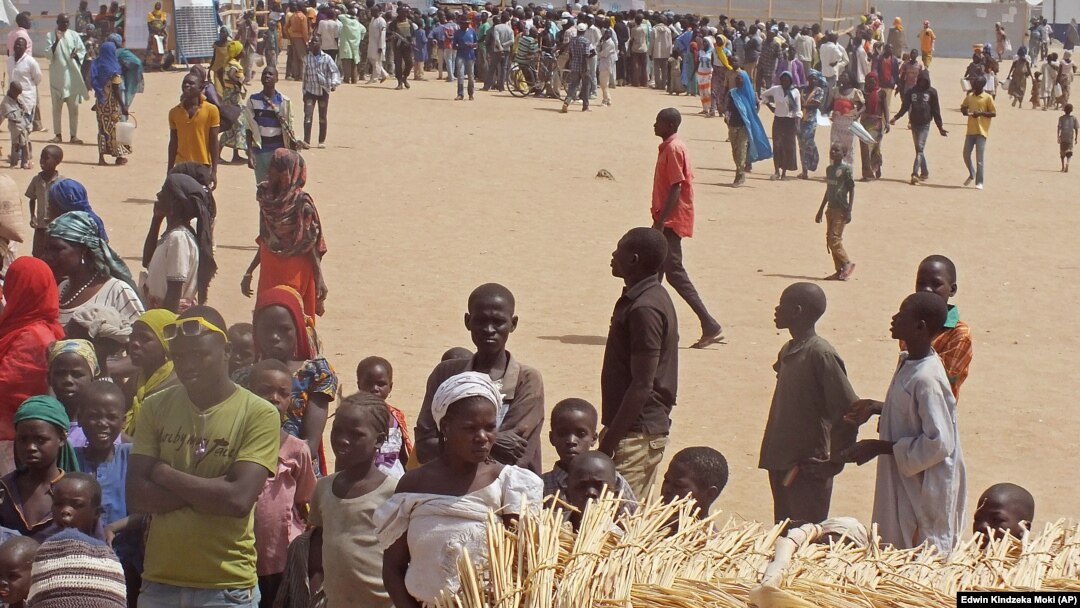 FILE - Refugees that fled their homes due to violence from the Islamic extremists group Boko Haram inside a refugee camp in Minawao, Cameroon, Feb. 25, 2015.
