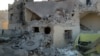 FILE - A medical facility is seen after it was hit by airstrikes in Syria's northern Idlib province, Nov. 25, 2016, in a photo provided by the Shafak Charity Organization. A similar facility was hit Wednesday in Idlib, in the town of Ma’aret Hurmeh. 