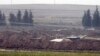 Turkish forces artillery pieces are seen on their new positions near the border with Syria in Sanliurfa province, Turkey. U.S.-backed Kurdish-led forces in Syria said American troops began withdrawing Monday from their positions, Oct. 6, 2019.