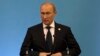 Russia's President Vladimir Putin speaks during the BRICS 2014 summit in Fortaleza, Brazil, Tuesday, July 15, 2014.