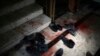 FILE - Blood stains and shoes remain on stairs inside a Sikh house of worship, in the aftermath of an attack on Sikh believers, in Kabul, Afghanistan, March 25, 2020. 